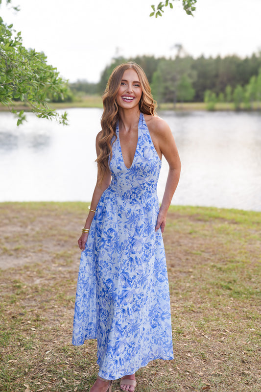 the arabesque in blue dress